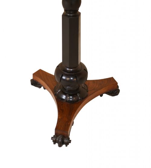 fig 1. Victorian mahogany lectern desk featuring a sloped leather writing surface, turned ebonised pedestal, and triform base with scroll feet.