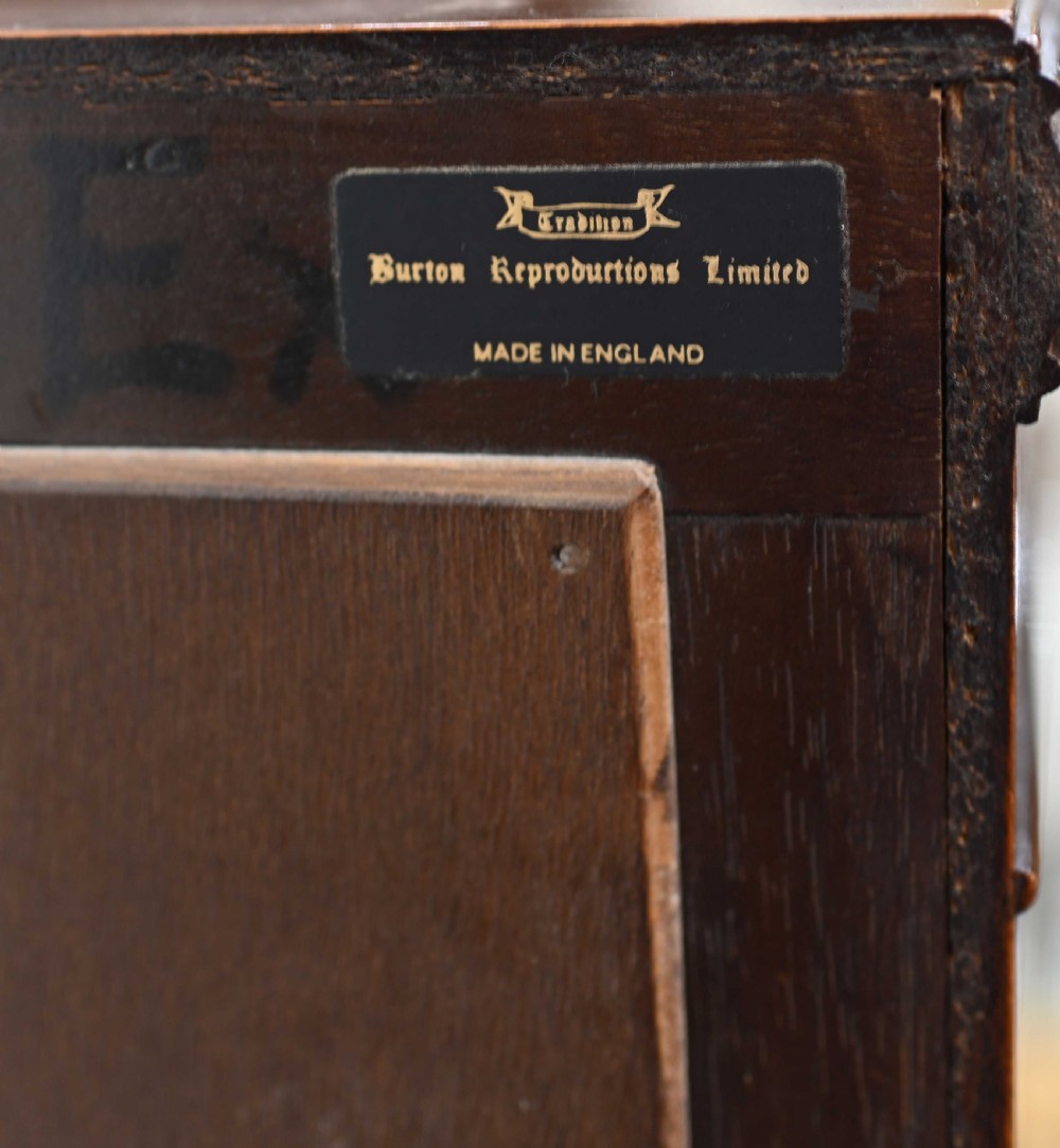 An Art Deco burr walnut drinks cabinet on a carved cabriole leg stand with ornate brass hardware and two lower drawers. View XIII