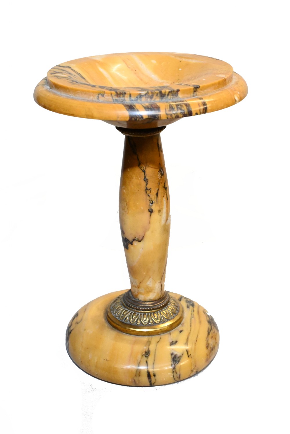 An antique French three-piece garniture set featuring an arched yellow veined marble clock flanked by two matching marble pedestal tazzas. View VIII