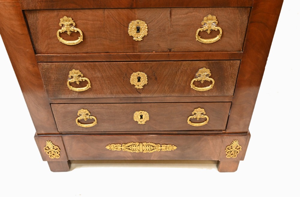 A late 19th-century French Empire mahogany escritoire desk featuring a dark marble top, drop-front writing compartment, three lower drawers, and ornamental gilt-bronze mounts. View VIII