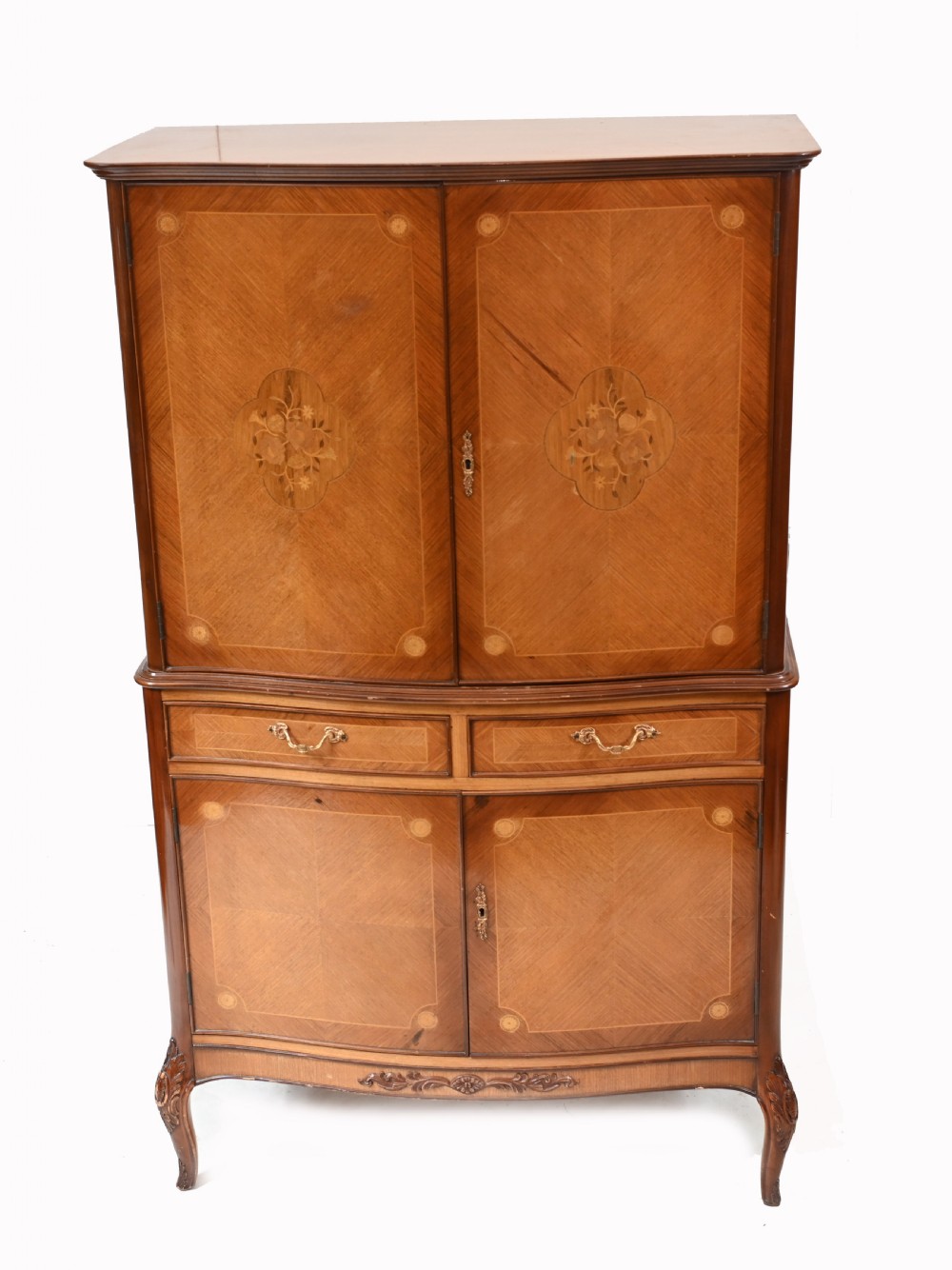 An Art Deco walnut drinks cabinet featuring floral marquetry panel doors, two central drawers, and carved cabriole legs. View II