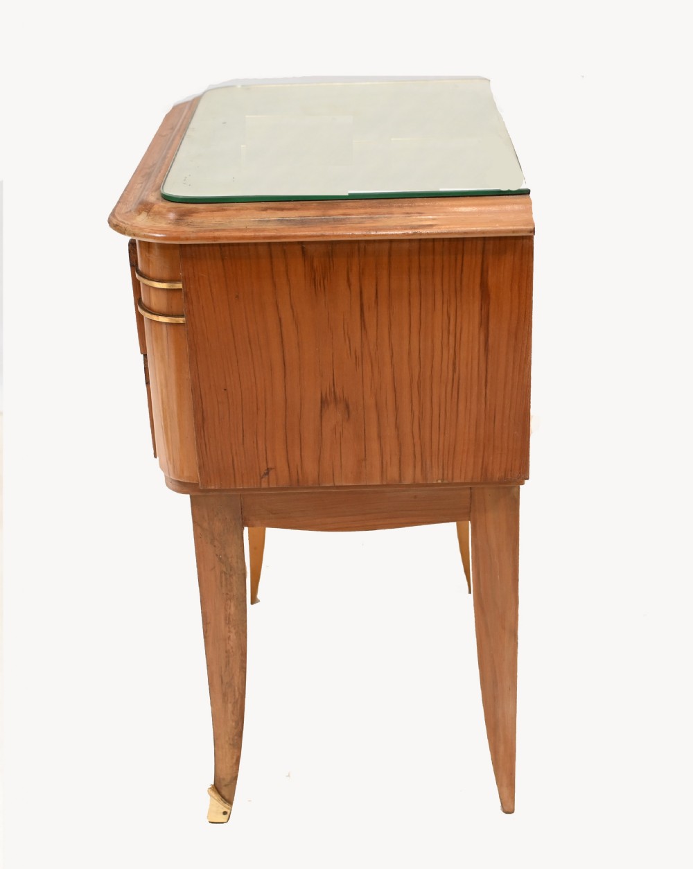 A pair of 1930s Art Deco wooden bedside cabinets featuring two drawers with diamond geometric veneers, rounded top edges with glass surface protectors, brass accents, and tapered legs. View III