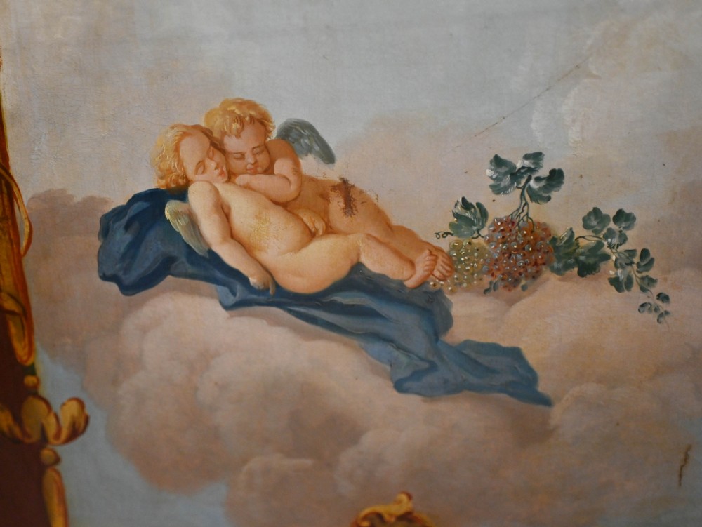 A red six-panel folding screen painted with classical figures, cherubs, and urns within gilded scrollwork borders. View IX