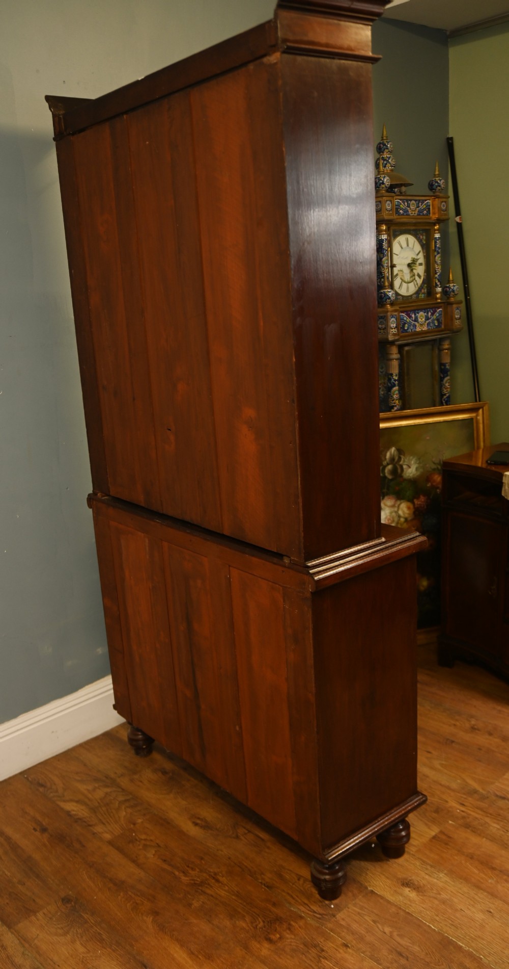 Victorian mahogany glazed bookcase featuring a two-door glass cabinet section resting on a chest of four drawers with brass handles. View X