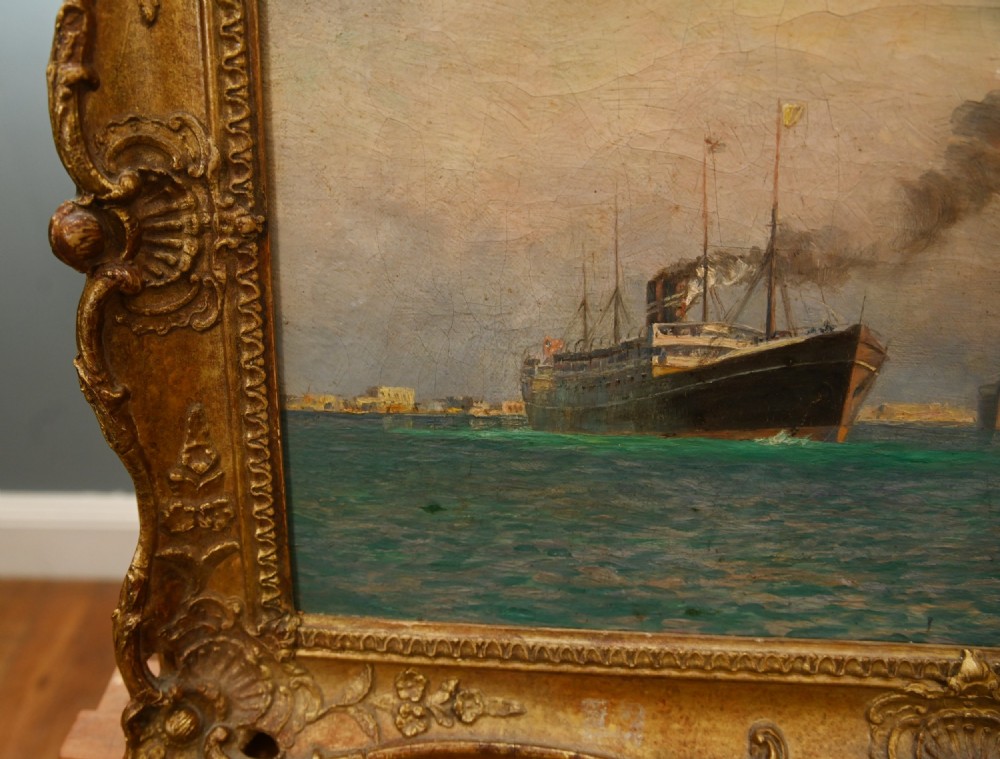 A Victorian oil painting depicting steamships near a shoreline, set in an ornate gilded frame. View V