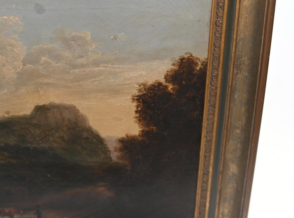 A Victorian oil painting depicting cattle near a stream in a pastoral landscape with hills and castle ruins, housed within a gilt and dark wooden frame. View V