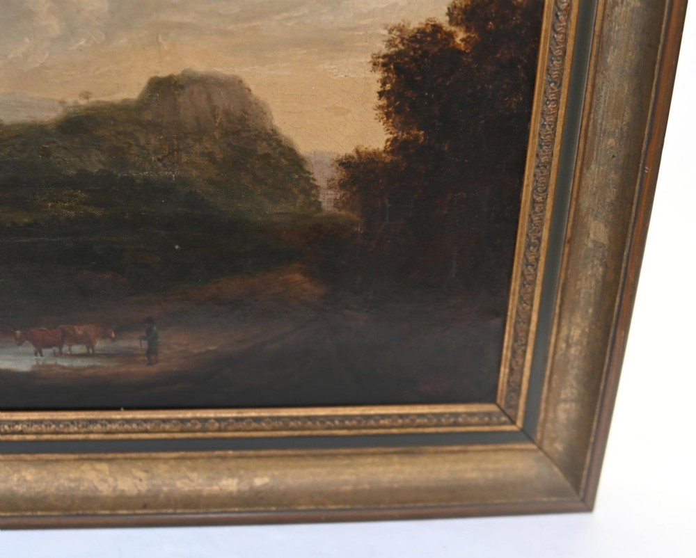 A Victorian oil painting depicting cattle near a stream in a pastoral landscape with hills and castle ruins, housed within a gilt and dark wooden frame. View VI
