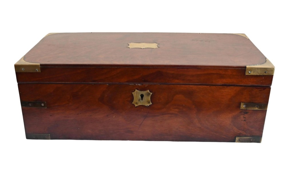 A rectangular warm brown mahogany wooden writing slope box featuring brass corner brackets and a shaped brass keyhole escutcheon. View III