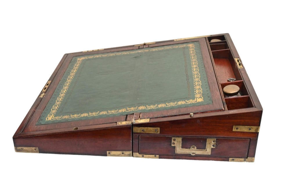 A rectangular warm brown mahogany wooden writing slope box featuring brass corner brackets and a shaped brass keyhole escutcheon. View VI