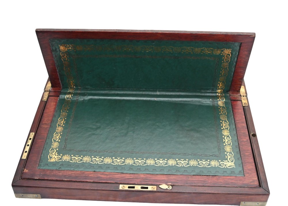 A rectangular warm brown mahogany wooden writing slope box featuring brass corner brackets and a shaped brass keyhole escutcheon. View VIII