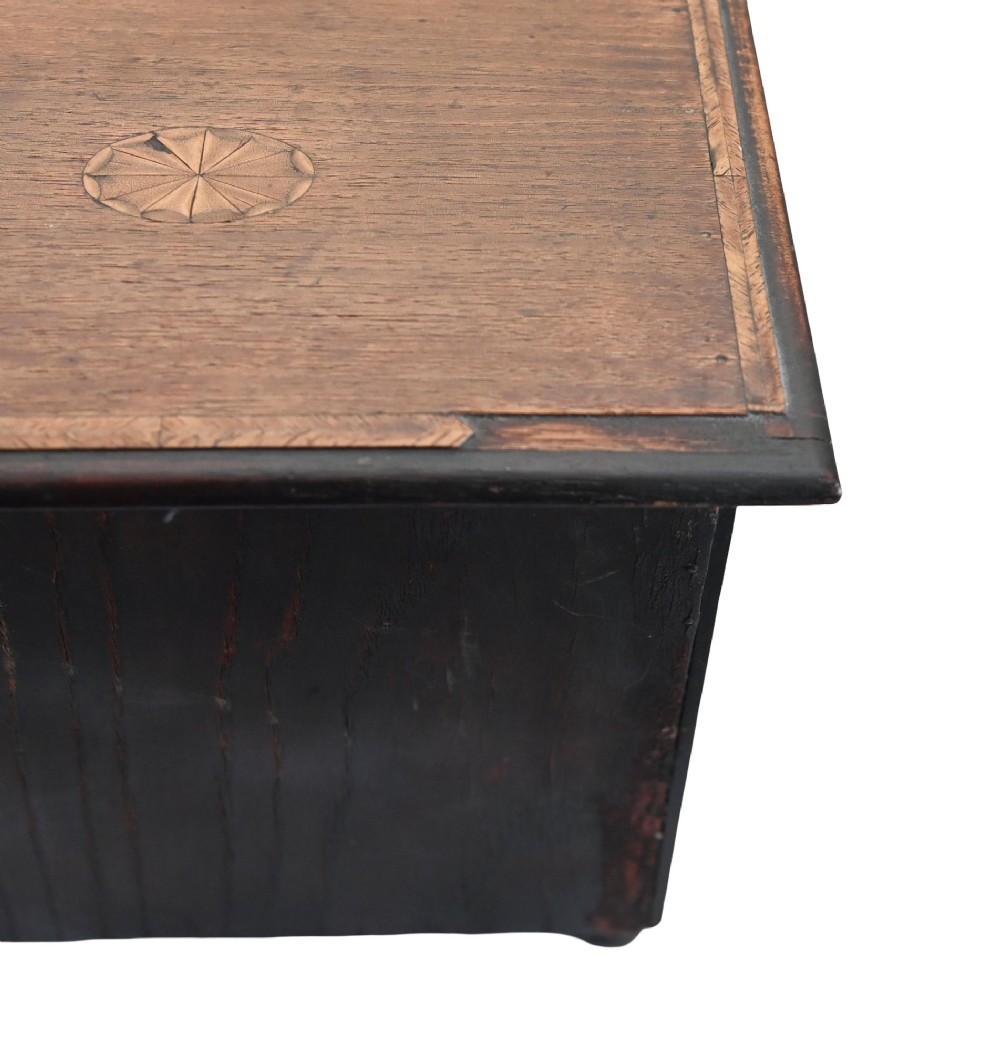 A Georgian Revival mahogany apprentice chest featuring two small top drawers over two full-width drawers with brass drop handles and an inlaid top border. View VIII