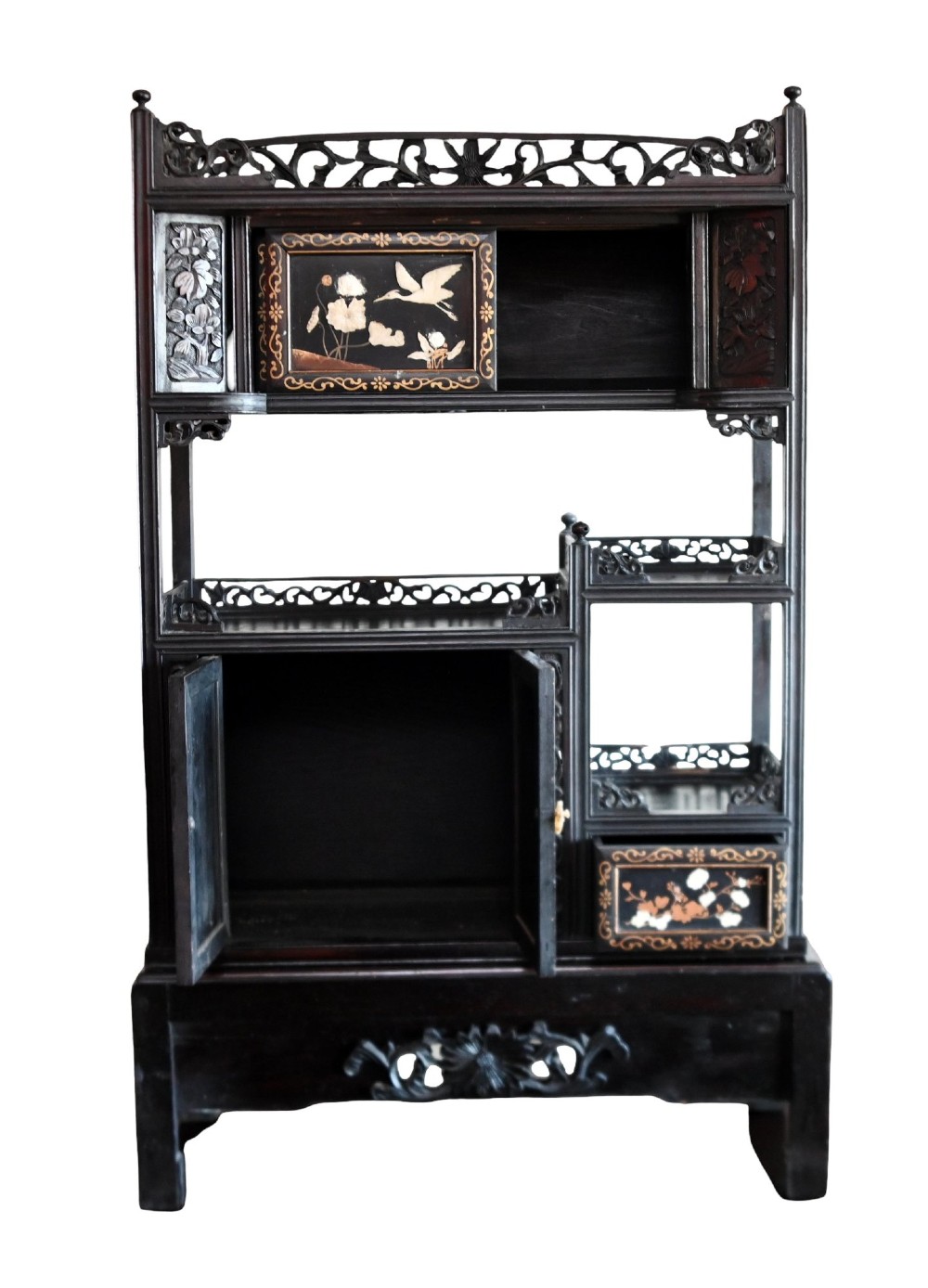 An antique ebonised Chinese display cabinet featuring asymmetrical shelves, pierced fretwork, and panels decorated with mother-of-pearl crane and botanical inlays. View VIII