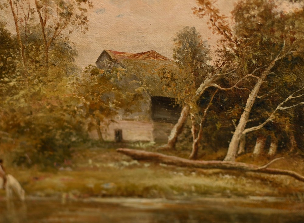 A 19th-century Victorian oil painting depicting a river landscape with trees and a wooden bridge, housed in a moulded gold gilt frame. View VII