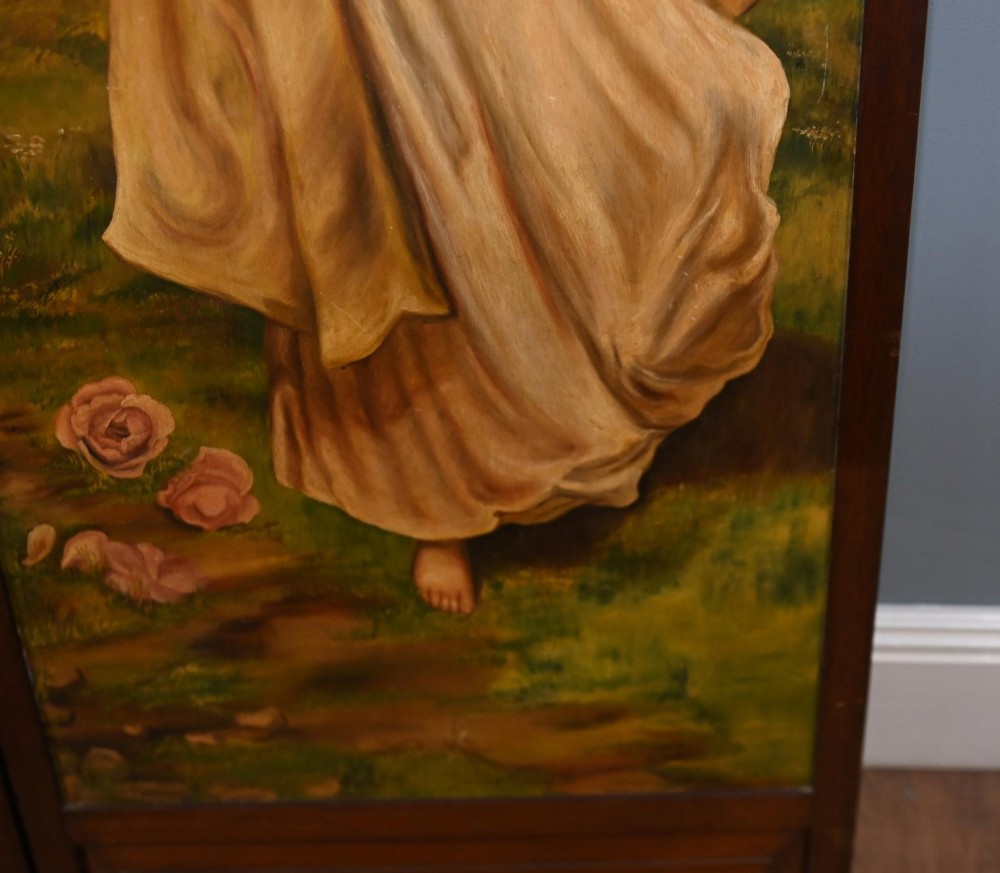 A Victorian three-panel mahogany folding screen featuring hand-painted figures in classical garments set against a garden background. View VIII