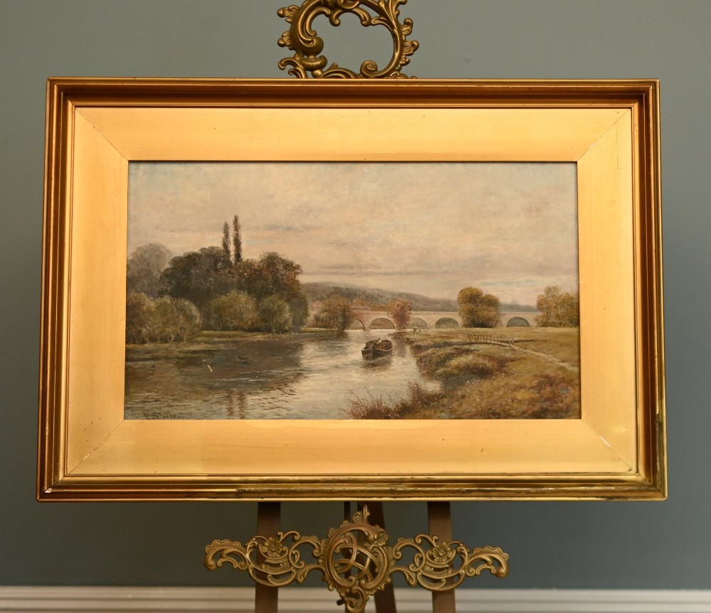 A Victorian oil painting depicting a peaceful scene along the River Thames with a distant stone bridge, presented in a wide gilt frame.