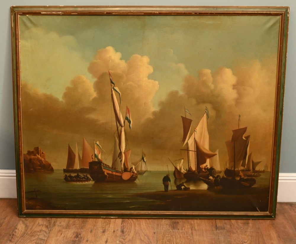 An antique Dutch maritime oil painting depicting sailing vessels resting in shallow coastal waters beneath a clouded sky.