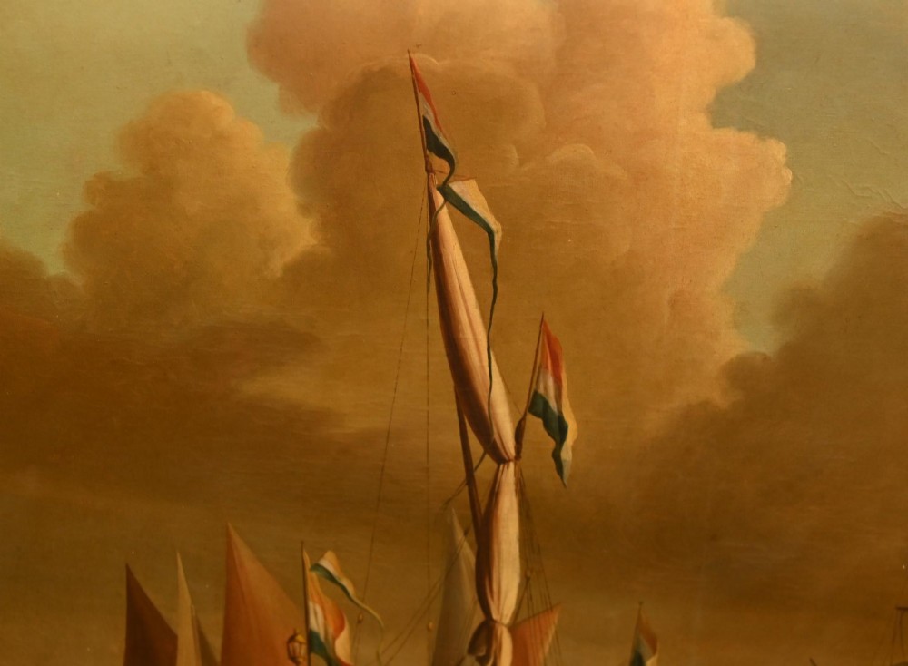 An antique Dutch maritime oil painting depicting sailing vessels resting in shallow coastal waters beneath a clouded sky. View IV