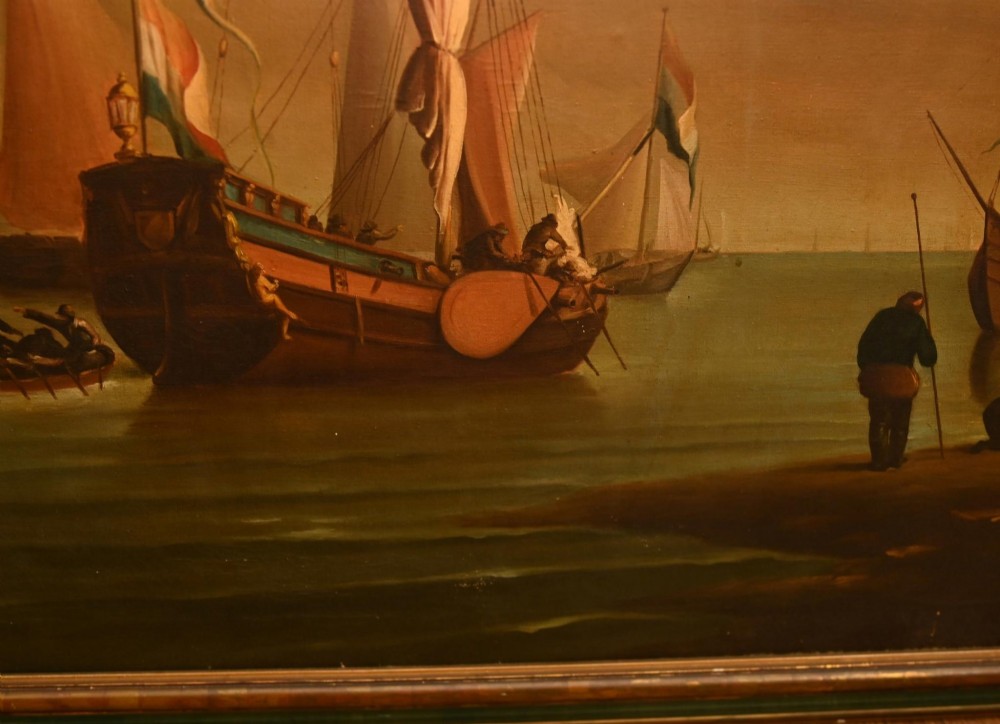 An antique Dutch maritime oil painting depicting sailing vessels resting in shallow coastal waters beneath a clouded sky. View VII