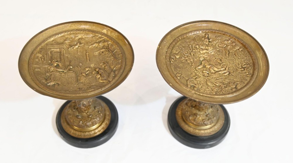 A pair of late 19th-century French ormolu classical tazzas with relief-cast circular dishes on decorative stems mounted on round black marble bases. View IV