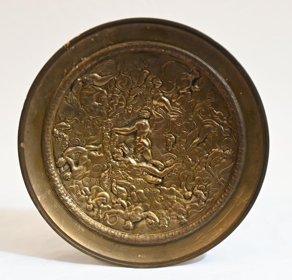 A pair of late 19th-century French ormolu classical tazzas with relief-cast circular dishes on decorative stems mounted on round black marble bases. View X