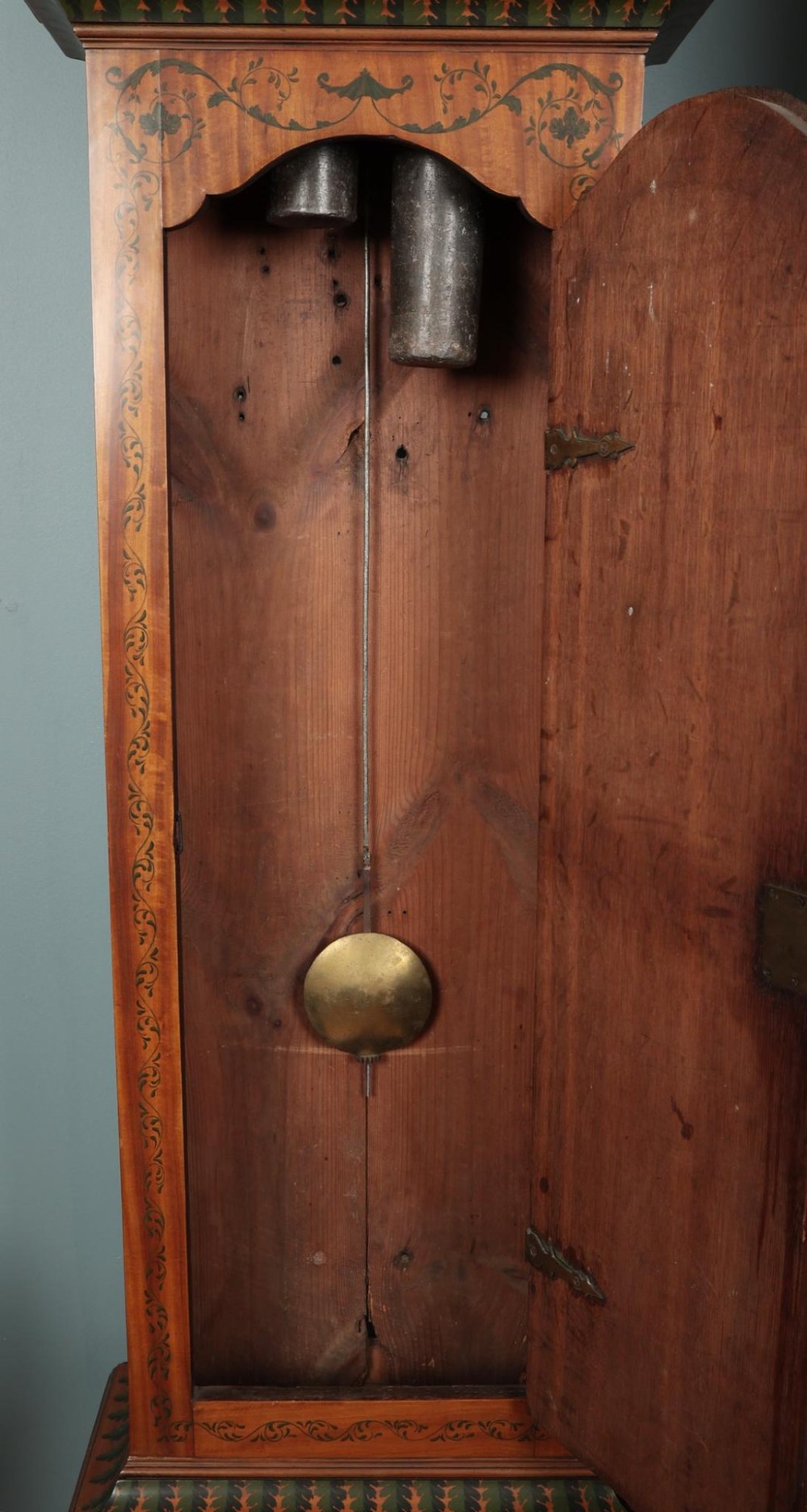 An antique Scottish painted satinwood longcase clock with an arched moonphase dial, brass finials, and neoclassical floral painted panels. View VIII