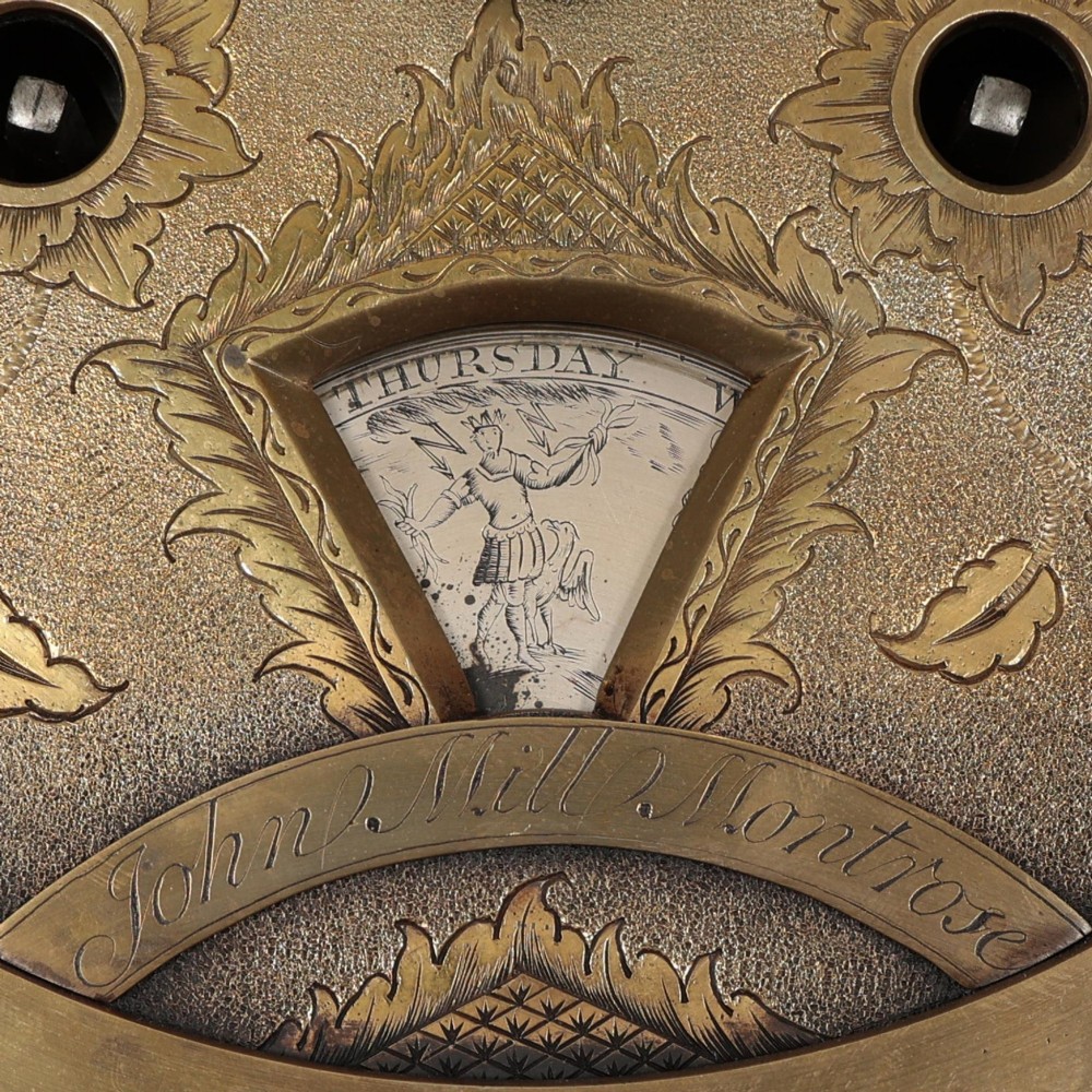 An antique Scottish painted satinwood longcase clock with an arched moonphase dial, brass finials, and neoclassical floral painted panels. View XIII