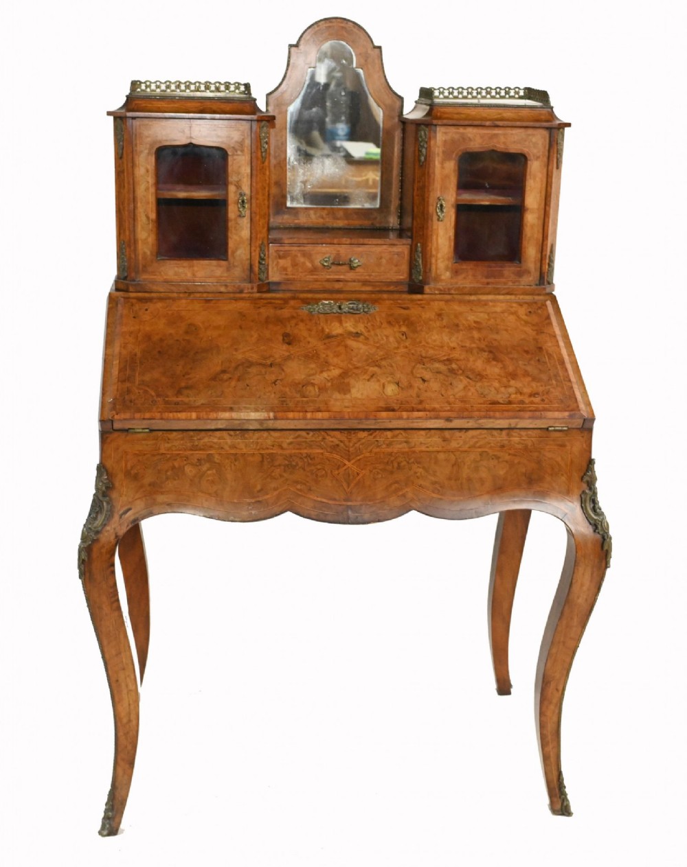 A 19th-century French walnut bonheur du jour desk featuring cabriole legs, a slant-front writing slope, and an upper superstructure with small glazed cabinets framing a central arched mirror. View III