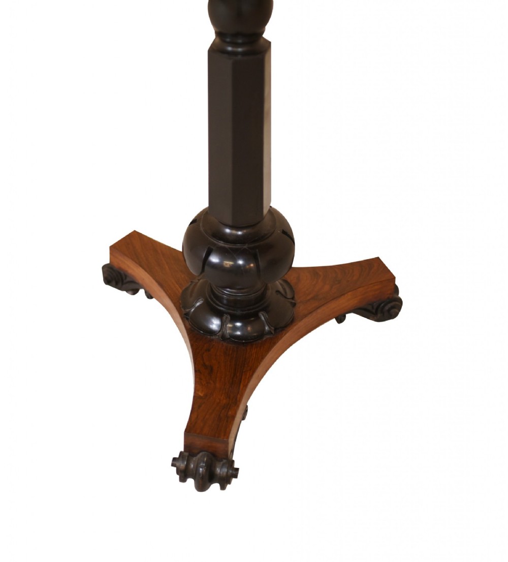 Victorian mahogany lectern desk featuring a sloped leather writing surface, turned ebonised pedestal, and triform base with scroll feet. View II