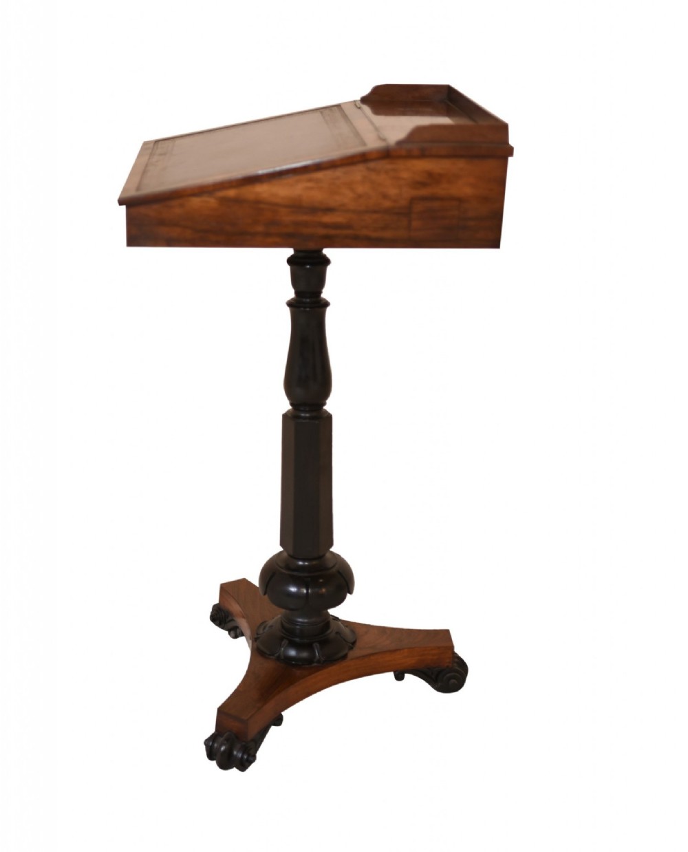 Victorian mahogany lectern desk featuring a sloped leather writing surface, turned ebonised pedestal, and triform base with scroll feet. View VI
