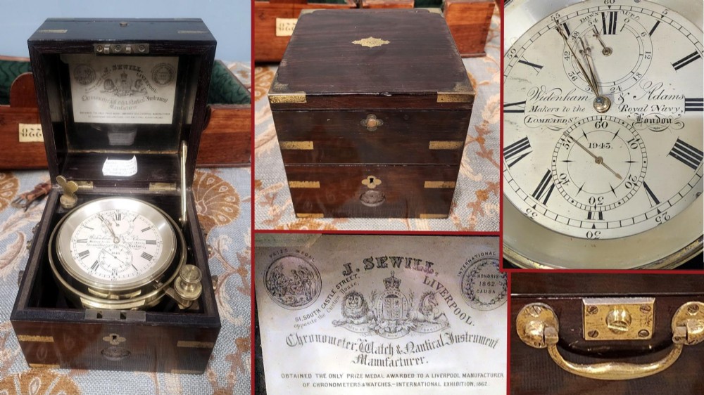 A Victorian brass marine chronometer mounted inside a brass-bound dark mahogany box with a printed manufacturer label. View II