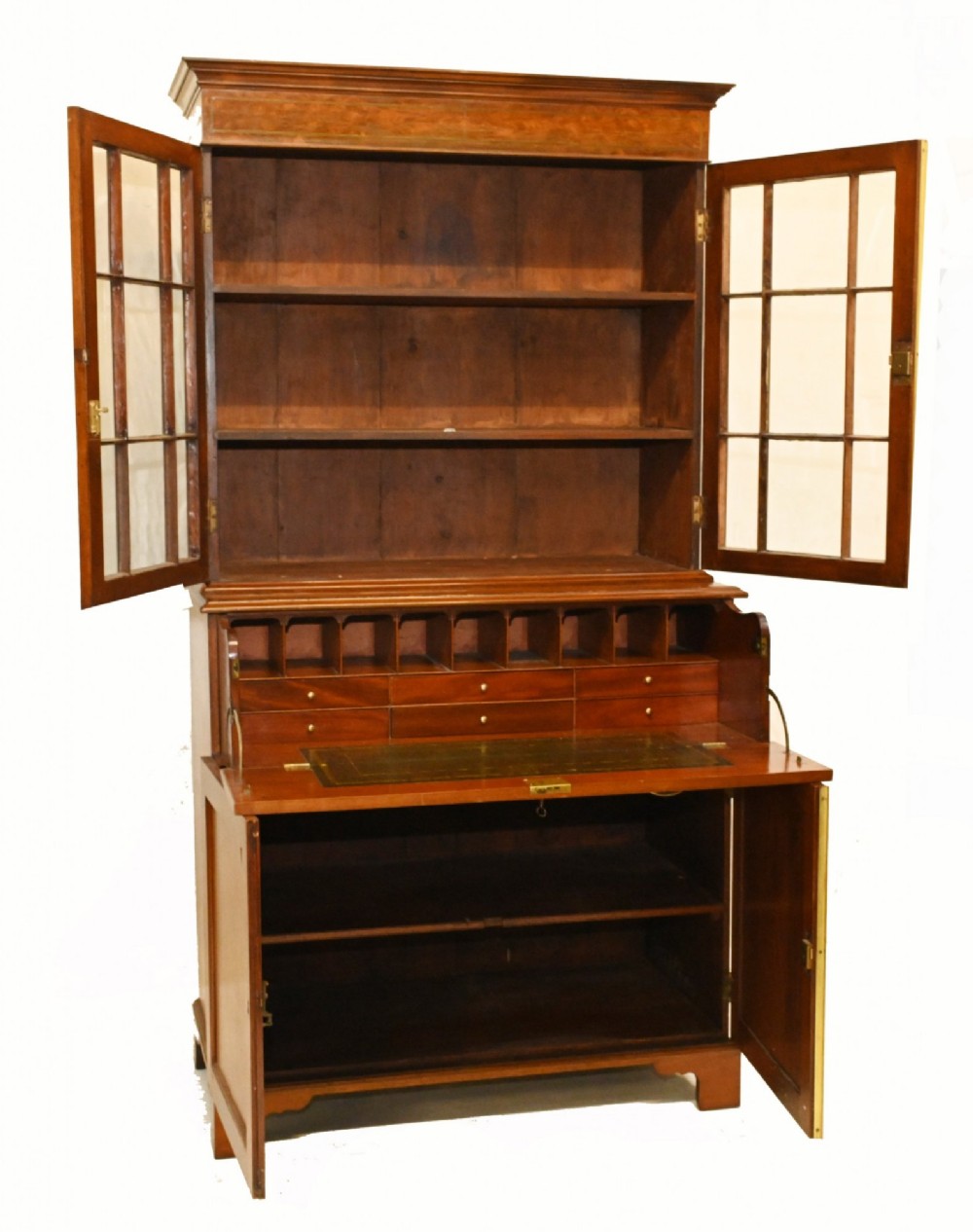 A Georgian mahogany secretaire bookcase featuring a glazed upper cabinet, a pull-out secretaire drawer with brass oval handles, and lower panelled doors. View V