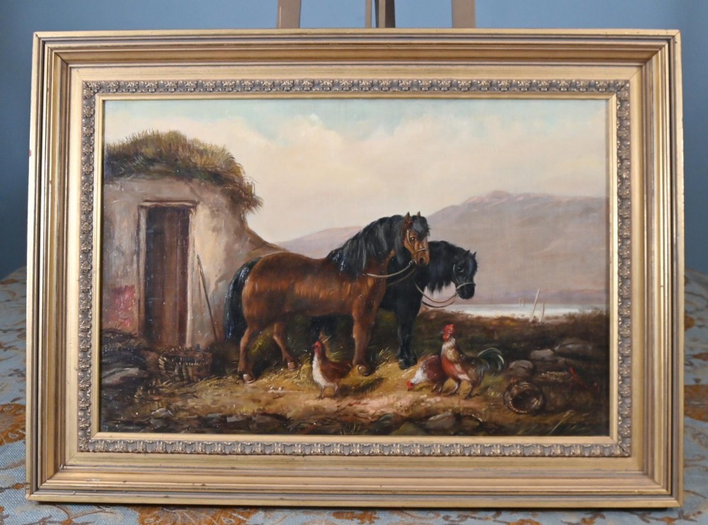 A 19th-century Victorian oil painting depicting two horses and chickens beside a thatched building with distant mountains, housed in a stepped gilt frame.