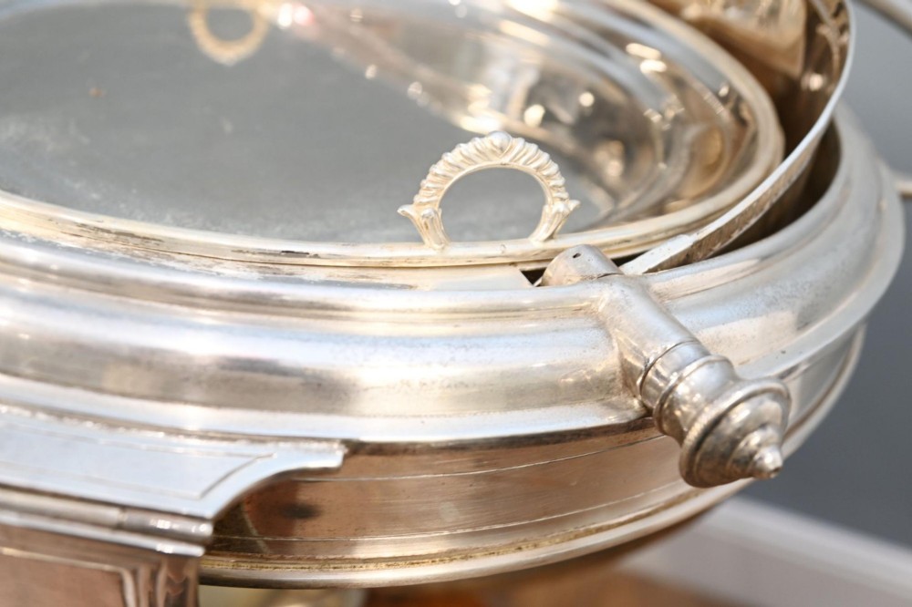 A Victorian silver-plated carvery trolley with a domed retractable cover set atop a carved mahogany pedestal base with swivel castors. View VIII