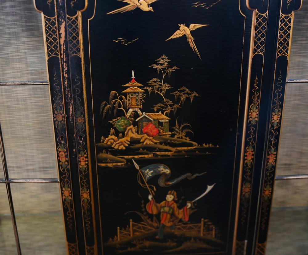 A black lacquered antique display cabinet featuring hand-painted gilded Chinoiserie scenes, two glazed side doors, and cabriole legs. View V