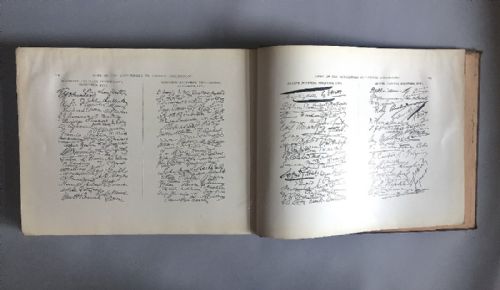 fig 2. A rectangular hardcover antique book bound in terracotta red cloth with gilded title lettering reading The Human Figure in Motion by Eadweard Muybridge.