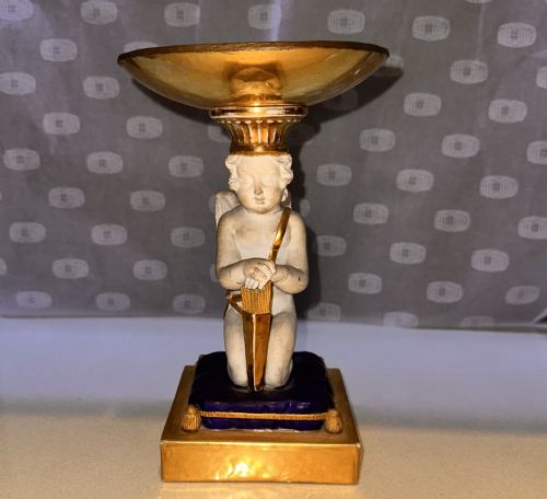 Angel Holding a Plinth on Its Head