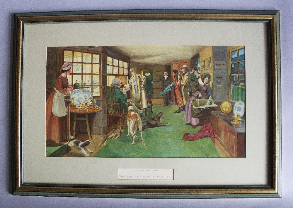 A framed coloured print depicting an interior scene at an English coaching inn with figures in period clothing, dogs, and Windsor chairs.