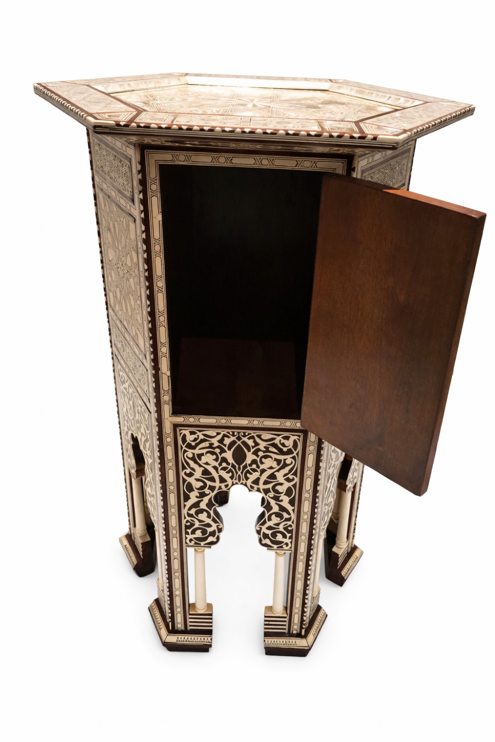 A 19th-century hexagonal side table featuring intricate geometric bone and mother-of-pearl inlay, a small central cupboard door, and arched lower apron supports. View II