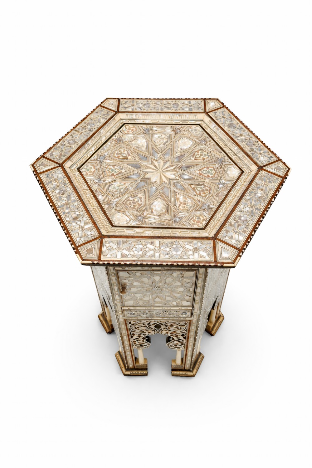 A 19th-century hexagonal side table featuring intricate geometric bone and mother-of-pearl inlay, a small central cupboard door, and arched lower apron supports. View III