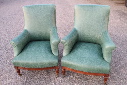 2 Arm Chairs