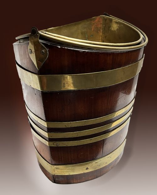 AN EARLY 19TH CENTURY BRASS BOUND ELLIPTICAL SHAPED MAHOGANY BUCKET - ADDITIONAL PHOTO 1