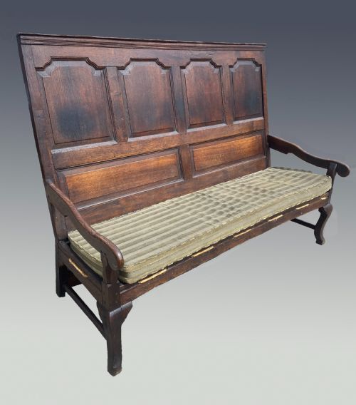 An English 18th Century Country House Oak Settle. Circa 1780