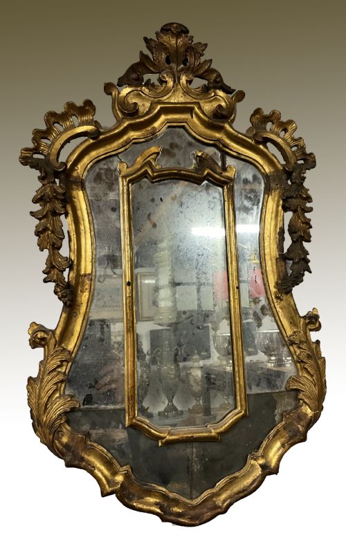 An 18th Century Continental Gilt Wood Wall Mirror