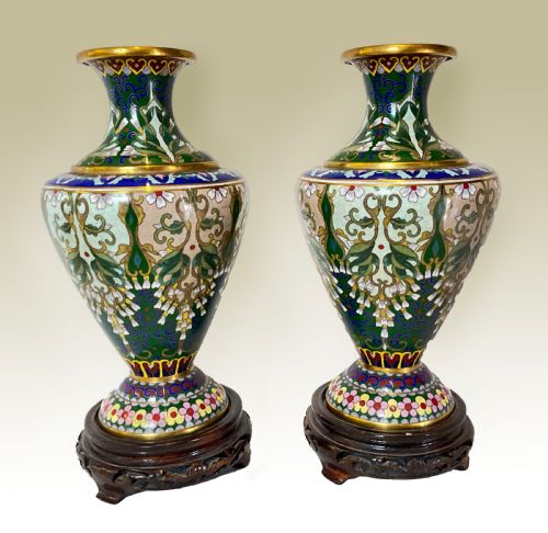 A Delightfully Decorative Pair of Cloisonné Vases on Wooden Bases