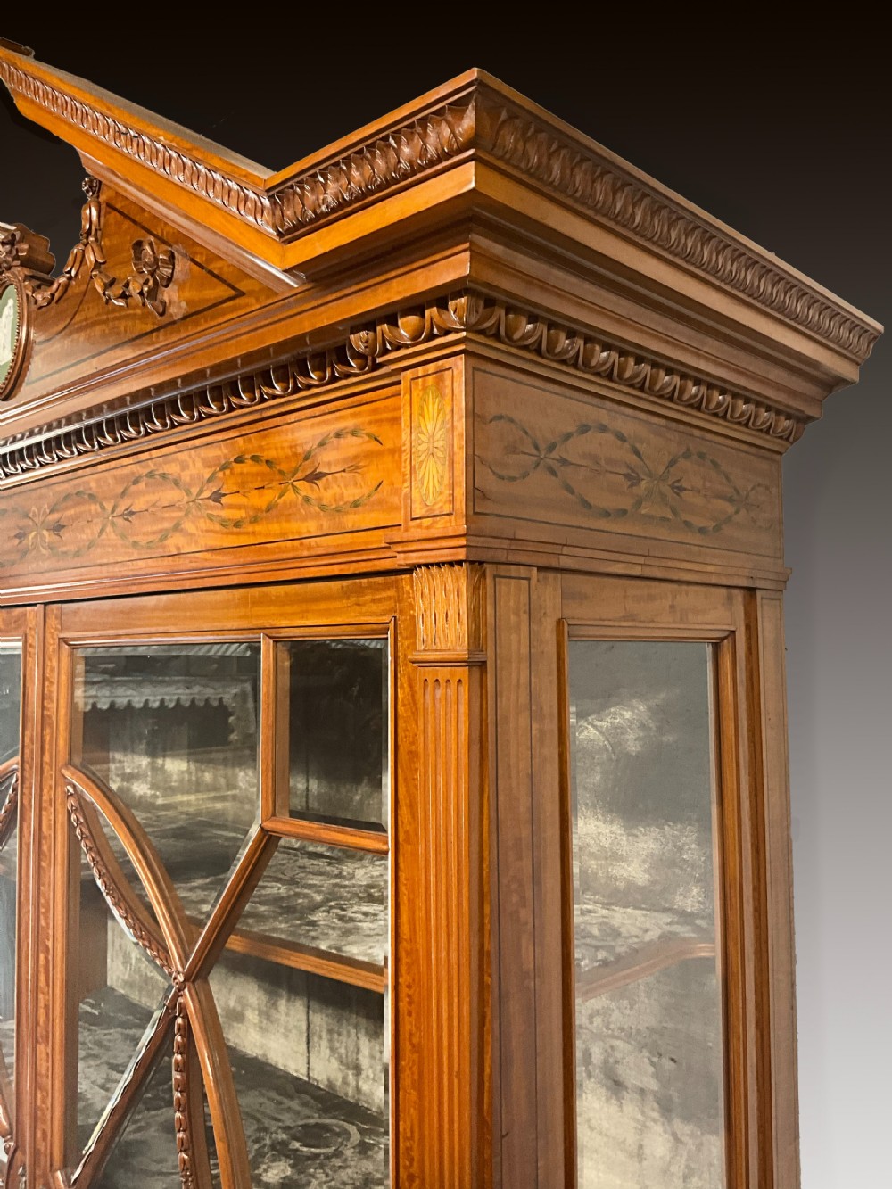 An exhibition quality satin wood and porcelain mounted cabinet with gold key. View III