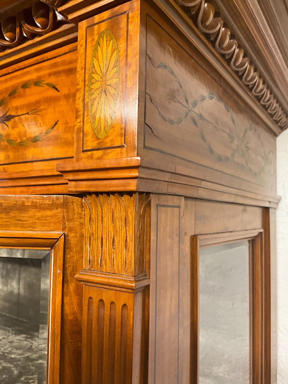 An exhibition quality satin wood and porcelain mounted cabinet with gold key. View V