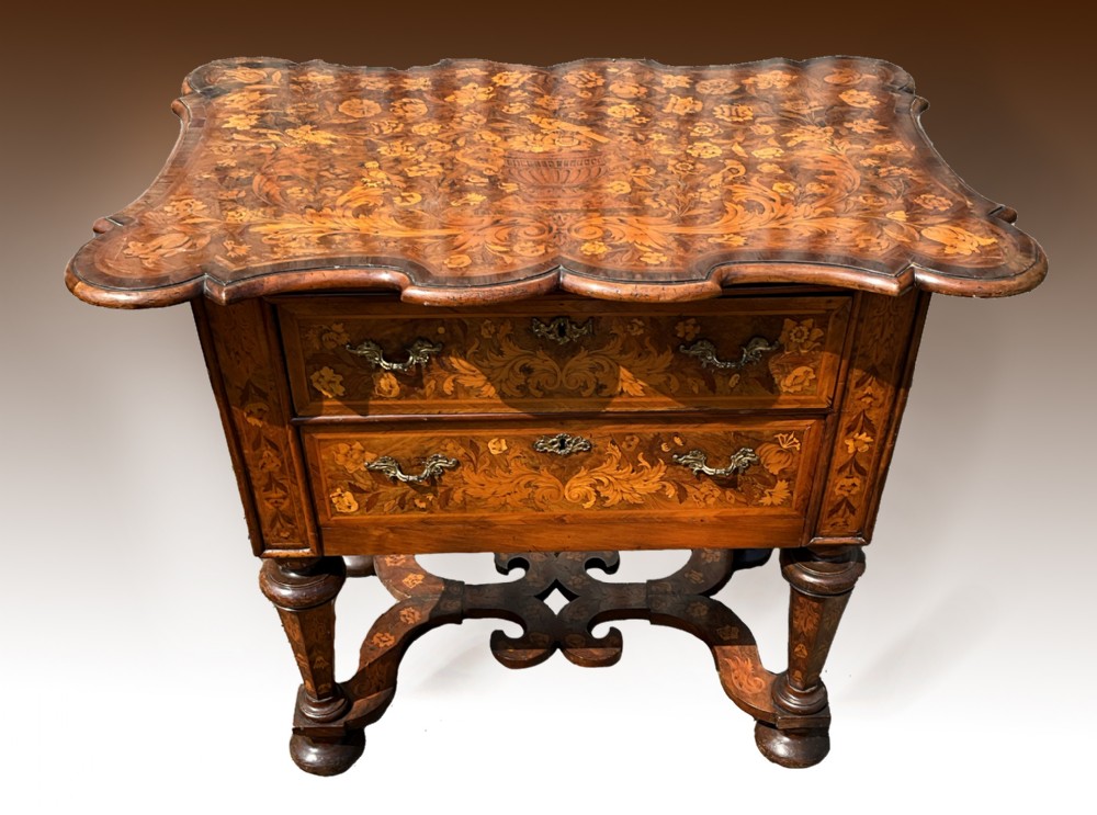 A Dutch Marquetry and Walnut Two Drawer Side Table. c.1820