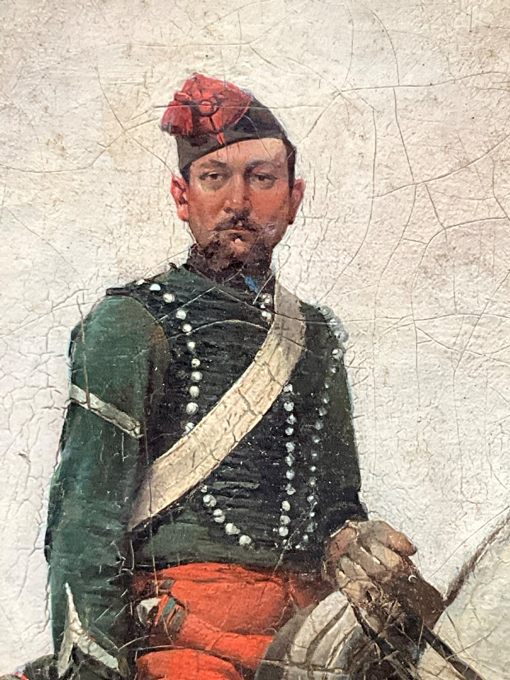 A nineteenth-century oil painting depicting a uniformed French cavalry officer seated atop a grey horse in a open landscape setting. View XII