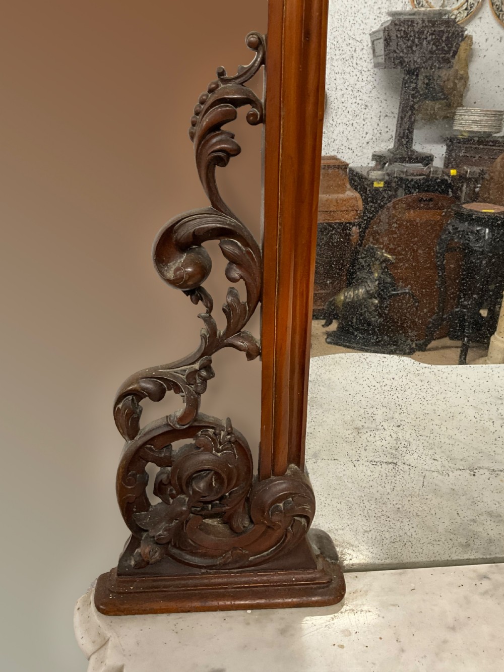A 19th-century Victorian burr walnut credenza with a white marble top, mirrored front panels, and a carved arching mirror frame top. View II