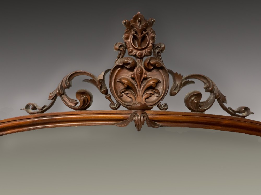 A 19th-century Victorian burr walnut credenza with a white marble top, mirrored front panels, and a carved arching mirror frame top. View III